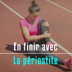 Athlète se tenant la jambe, cherchant à soigner une périostite tibiale rapidement.