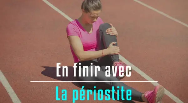 Athlète se tenant la jambe, cherchant à soigner une périostite tibiale rapidement.